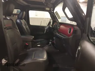 2021 Jeep Wrangler Unlimited Rubicon with VIN 1C4HJXFN2MW719135, listed as a IAAI auction lot 41835698 with 20,447 mi miles and . Bid and sale history available at DreamBid. Image 5.