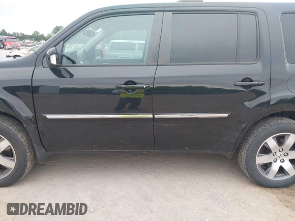 2015 Honda Pilot Touring with VIN 5FNYF4H9XFB036493, listed as a IAAI auction lot 42190624 with 223,675 mi miles and . Bid and sale history available at DreamBid. Image 6.