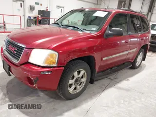 2005 GMC Envoy SLT with VIN 1GKDT13S352324863, listed as a IAAI auction lot 41707649 with 247,326 mi miles. Bid and sale history available at carsss.com. Image 2.