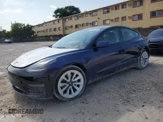 2023 Tesla Model 3 z VIN 5YJ3E1EA3PF434205, wystawiony jako Copart lot #57917305 z przebiegiem 82 481 mil mil oraz Szkody całkowita. Historia ofert i sprzedaży dostępna na DreamBid. Obrazek 1.