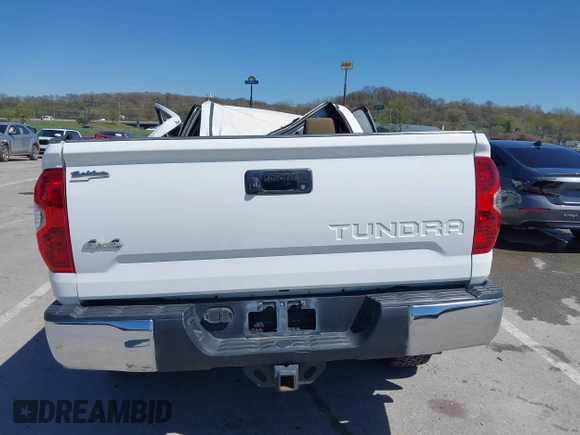 2014 Toyota Tundra 4WD Truck SR5 with VIN 5TFDW5F1XEX390763, listed as a IAAI auction lot 41973864 with 117,369 mi miles. Bid and sale history available at carsss.com. Image 16.