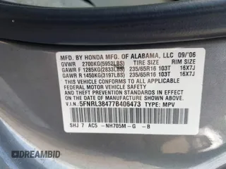 2007 Honda Odyssey EX z VIN 5FNRL38477B406473, wystawiony jako IAAI lot #42364081 z przebiegiem 214 511 mil mil oraz . Historia ofert i sprzedaży dostępna na DreamBid. Obrazek 9.