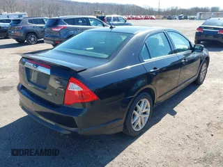 2012 Ford Fusion SEL with VIN 3FAHP0JAXCR387351, listed as a IAAI auction lot 41865873 with 158,521 mi miles. Bid and sale history available at carsss.com. Image 4.