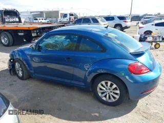 2018 Volkswagen Beetle S with VIN 3VWFD7AT9JM712664, listed as a IAAI auction lot 41634663 with 72,649 mi miles. Bid and sale history available at carsss.com. Image 14.