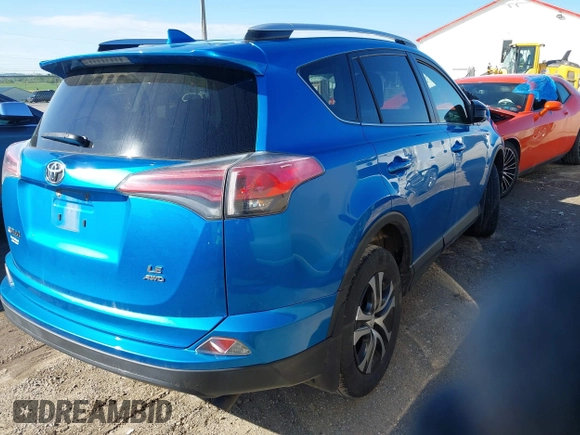 2016 Toyota RAV4 LE with VIN JTMBFREV2GD183811, listed as a IAAI auction lot 42216793 with 95,270 mi miles and . Bid and sale history available at DreamBid. Image 4.