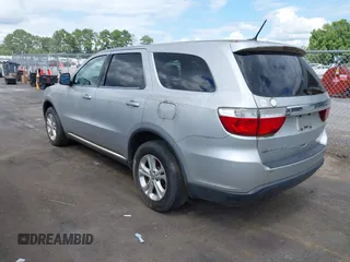2013 Dodge Durango SXT with VIN 1C4RDHAG4DC571663, listed as a IAAI auction lot 42769759 with 178,033 mi miles and . Bid and sale history available at DreamBid. Image 3.