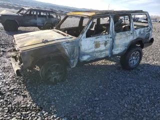 1998 Jeep Cherokee SE with VIN 1J4FT28S2WL151412, listed as a Copart auction lot 46614225 with Not provided miles and Salvage title. Bid and sale history available at DreamBid. Image 1.