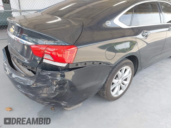 2018 Chevrolet Impala LT with VIN 1G1105S34JU122484, listed as a IAAI auction lot 42081792 with 166,943 mi miles and . Bid and sale history available at DreamBid. Image 4.
