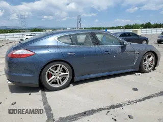 2010 Porsche Panamera Turbo with VIN WP0AC2A70AL090897, listed as a Copart auction lot 60986335 with 120,334 mi miles and Salvage title. Bid and sale history available at DreamBid. Image 3.