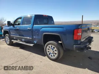 2015 GMC Sierra 2500HD available WiFi Denali with VIN 1GT120E86FF641950, listed as a Copart auction lot 42442845 with 151,113 mi miles and Salvage Title. Bid and sale history available at carsss.com. Image 2.