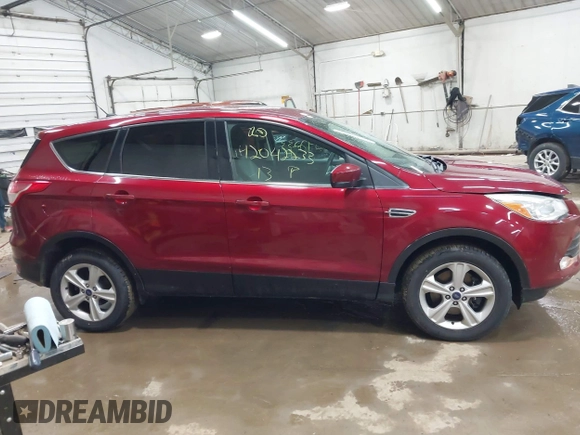 2013 Ford Escape SE with VIN 1FMCU9GX1DUC56361, listed as a IAAI auction lot 42042233 with 136,441 mi miles and . Bid and sale history available at DreamBid. Image 13.