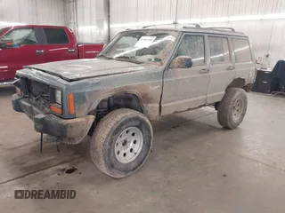 1998 Jeep Cherokee Sport with VIN 1J4FJ68S5WL284937, listed as a IAAI auction lot 41984490 with 259,716 mi miles and . Bid and sale history available at DreamBid. Image 2.