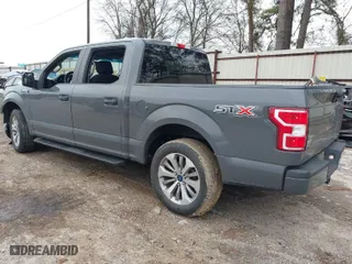 2018 Ford F-150 XL with VIN 1FTEW1CP4JFD00156, listed as a IAAI auction lot 41571979 with 153,167 mi miles. Bid and sale history available at carsss.com. Image 3.