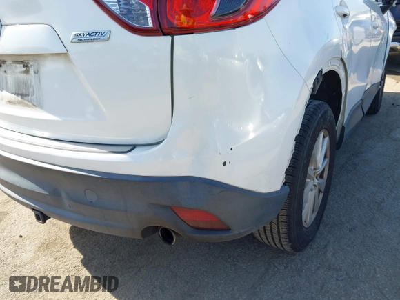 2013 Mazda CX-5 Sport with VIN JM3KE2BE4D0153251, listed as a IAAI auction lot 42297235 with 177,019 mi miles and . Bid and sale history available at DreamBid. Image 21.