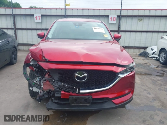 2019 Mazda CX-5 Touring with VIN JM3KFACM7K0696815, listed as a IAAI auction lot 41921763 with 46,900 mi miles. Bid and sale history available at carsss.com. Image 13.