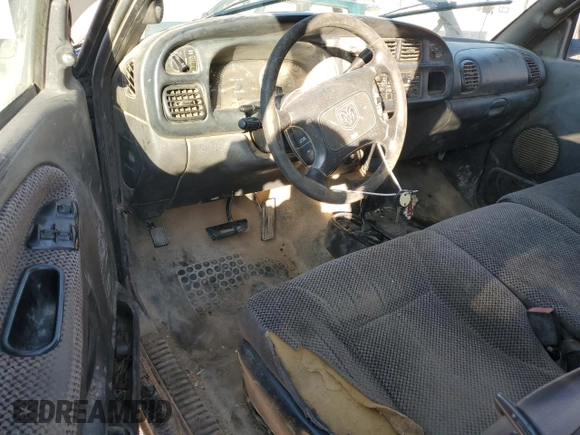 2000 Dodge 2500 z VIN 1B7KF2367YJ189044, wystawiony jako Copart lot #74920094 z przebiegiem 263 440 mil mil oraz Szkoda całkowita • Salvage title. Historia ofert i sprzedaży dostępna na DreamBid. Obrazek 8.