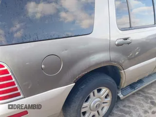 2005 Mercury Mountaineer Convenience z VIN 4M2ZU86W85ZJ07395, wystawiony jako IAAI lot #41767380 z przebiegiem 276 551 mil mil oraz . Historia ofert i sprzedaży dostępna na DreamBid. Obrazek 13.