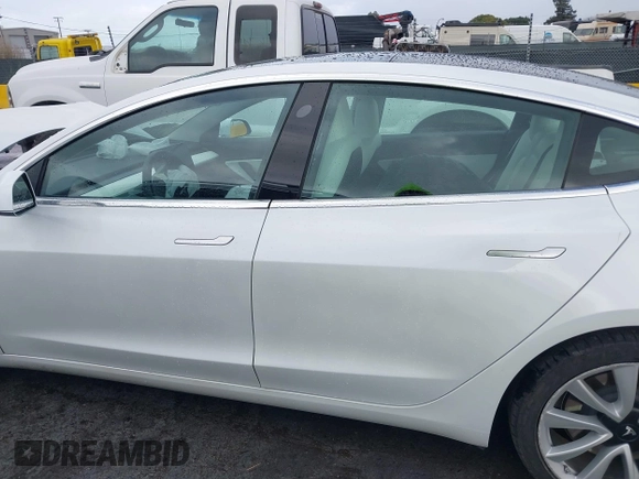2020 Tesla Model 3 Standard Range Plus with VIN 5YJ3E1EA0LF741311, listed as a IAAI auction lot 41581931 with 43,284 mi miles. Bid and sale history available at carsss.com. Image 14.