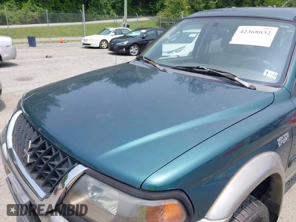 2004 Mitsubishi Montero XLS z VIN JA4MT31R34J007557, wystawiony jako IAAI lot #42368032 z przebiegiem 172 104 mil mil oraz . Historia ofert i sprzedaży dostępna na DreamBid. Obrazek 13.