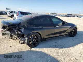 2015 BMW M6 z VIN WBS6C9C5XFD467952, wystawiony jako Copart lot #46312895 z przebiegiem 79 807 mil mil oraz Szkoda całkowita • Salvage title. Historia ofert i sprzedaży dostępna na DreamBid. Obrazek 3.
