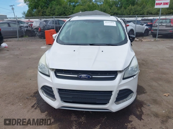 2016 Ford Escape SE z VIN 1FMCU9GX3GUB85250, wystawiony jako IAAI lot #42322056 z przebiegiem 187 833 mil mil oraz . Historia ofert i sprzedaży dostępna na DreamBid. Obrazek 12.