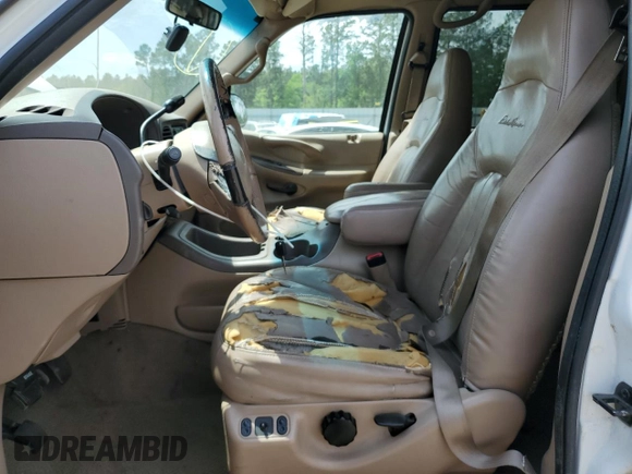 1999 Ford Expedition XLT z VIN 1FMPU18L0XLC10111, wystawiony jako Copart lot #52699205 z przebiegiem Nie podano mil oraz Szkoda całkowita • Salvage title. Historia ofert i sprzedaży dostępna na DreamBid. Obrazek 7.