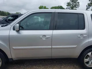 2014 Honda Pilot EX-L with VIN 5FNYF3H73EB011880, listed as a IAAI auction lot 42157396 with 73,881 mi miles and . Bid and sale history available at carsss.com. Image 15.