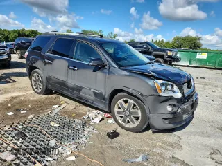 2012 GMC Acadia Denali with VIN 1GKKVTED8CJ130148, listed as a Copart auction lot 63664875 with 138,918 mi miles and Salvage title. Bid and sale history available at DreamBid. Image 4.