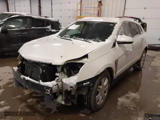 2016 Cadillac SRX Luxury Collection with VIN 3GYFNEE34GS582435, listed as a IAAI auction lot 41325240 with 164,162 mi miles. Bid and sale history available at carsss.com. Image 2.
