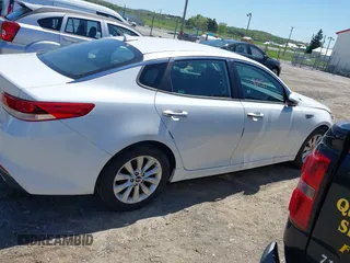 2016 Kia Optima LX with VIN 5XXGT4L31GG008961, listed as a IAAI auction lot 42148050 with 184,465 mi miles. Bid and sale history available at carsss.com. Image 13.