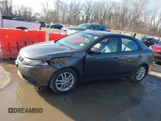 2012 Kia Forte EX with VIN KNAFU4A27C5476031, listed as a IAAI auction lot 41633058 with 137,998 mi miles. Bid and sale history available at carsss.com. Image 14.