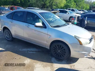 2010 Ford Focus SES with VIN 1FAHP3GN5AW115229, listed as a IAAI auction lot 42098503 with 156,127 mi miles. Bid and sale history available at carsss.com. Image 1.