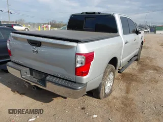 2017 Nissan Titan SV with VIN 1N6AA1EJ3HN538034, listed as a IAAI auction lot 41863785 with 204,198 mi miles and . Bid and sale history available at DreamBid. Image 4.