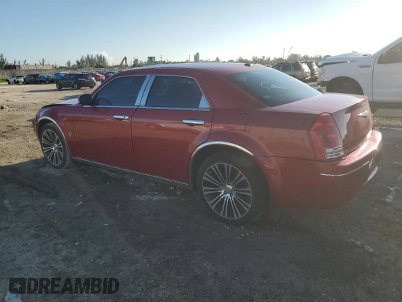 2010 Chrysler 300 with VIN 2C3CA2CVXAH330680, listed as a Copart auction lot 71732154 with 169,895 mi miles and Salvage Title. Bid and sale history available at carsss.com. Image 2.