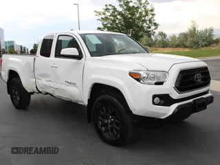 2021 Toyota Tacoma SR with VIN 3TYSZ5ANXMT010581, listed as a Copart auction lot 63833405 with 102,829 mi miles and Salvage title. Bid and sale history available at DreamBid. Image 1.