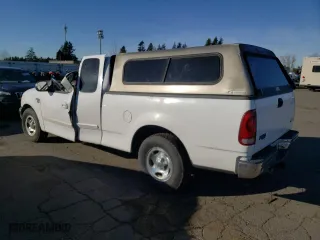 1999 Ford F-150 Work Series with VIN 1FTRX17W7XKA41548, listed as a Copart auction lot 88334145 with 0 mi miles and Salvage Title. Bid and sale history available at carsss.com. Image 2.
