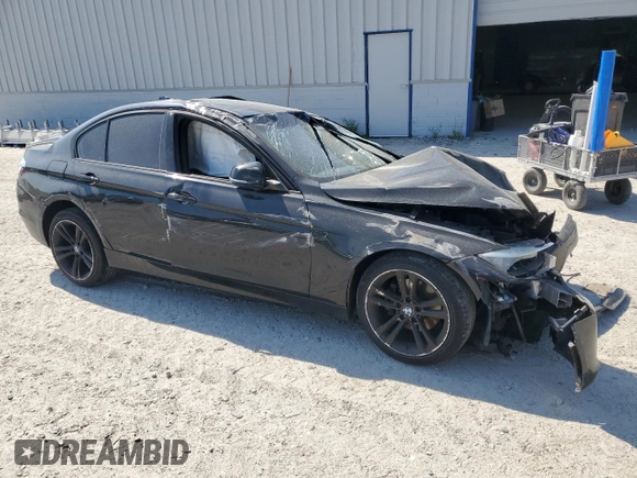 2013 BMW 3 Series 328i xDrive with VIN WBA3B5G51DNS01059, listed as a Copart auction lot 53052185 with Not provided miles and Clean title. Bid and sale history available at DreamBid. Image 4.
