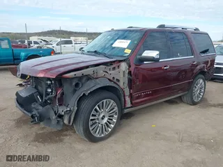 2015 Lincoln Navigator with VIN 5LMJJ2JT4FEJ12021, listed as a IAAI auction lot 41880471 with 104,979 mi miles. Bid and sale history available at carsss.com. Image 19.