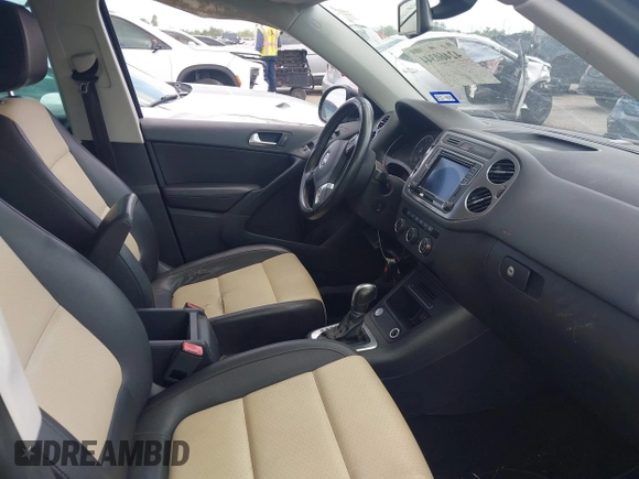 2016 Volkswagen Tiguan R-Line with VIN WVGAV7AX4GW602817, listed as a IAAI auction lot 42460344 with 124,612 mi miles and . Bid and sale history available at DreamBid. Image 5.
