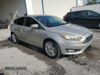2016 Ford Focus Titanium with VIN 1FADP3N24GL302625, listed as a Copart auction lot 59180675 with 97,401 mi miles and Salvage title. Bid and sale history available at DreamBid. Image 4.