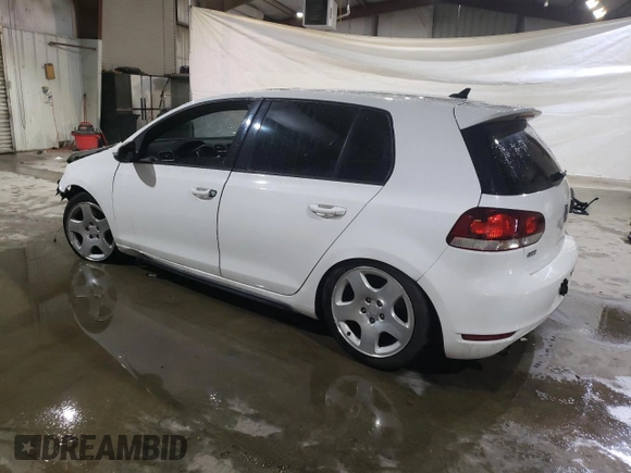 2013 Volkswagen GTI с VIN WVWGD7AJ1DW124574, выставлен на аукционе Copart как лот 44914075 с пробегом Не указан миль и Списание • Salvage title. История ставок и продаж доступна на DreamBid. Изображение 2.