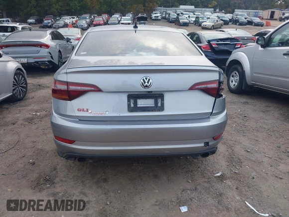 2019 Volkswagen Jetta GLI S z VIN 3VW5T7BU4KM165083, wystawiony jako IAAI lot #40729763 z przebiegiem 75 414 mil mil oraz . Historia ofert i sprzedaży dostępna na DreamBid. Obrazek 16.