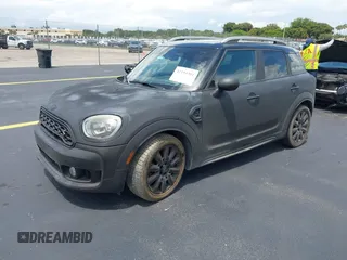 2018 MINI Countryman Cooper S z VIN WMZYT3C35J3E00804, wystawiony jako IAAI lot #42194381 z przebiegiem 101 634 mil mil oraz . Historia ofert i sprzedaży dostępna na DreamBid. Obrazek 17.