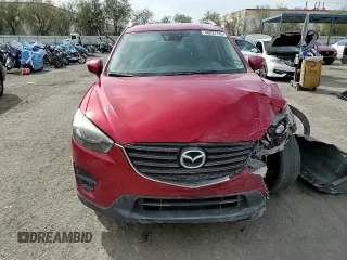 2016 Mazda CX-5 Grand Touring with VIN JM3KE4DY0G0820954, listed as a Copart auction lot 48027785 with 152,448 mi miles and Salvage Title. Bid and sale history available at carsss.com. Image 11.