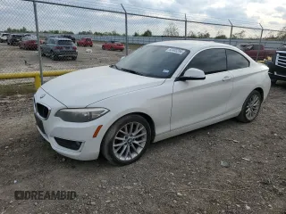 2014 BMW 2 Series 228i with VIN WBA1F5C50EV255830, listed as a Copart auction lot 82403254 with 69,286 mi miles and Salvage Title. Bid and sale history available at carsss.com. Image 1.