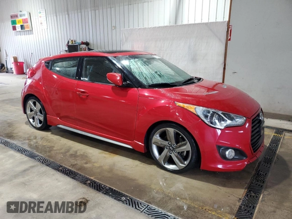 2013 Hyundai Veloster Turbo z VIN KMHTC6AE7DU111060, wystawiony jako Copart lot #57816425 z przebiegiem 140 842 mil mil oraz Szkoda całkowita • Salvage title. Historia ofert i sprzedaży dostępna na DreamBid. Obrazek 4.