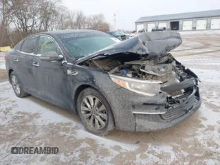 2018 Kia Optima LX with VIN 5XXGT4L30JG253354, listed as a IAAI auction lot 41086216 with 68,885 mi miles. Bid and sale history available at carsss.com. Image 1.