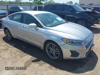 2020 Ford Fusion SEL with VIN 3FA6P0CDXLR196124, listed as a IAAI auction lot 42244231 with 99,306 mi miles and . Bid and sale history available at DreamBid. Image 1.