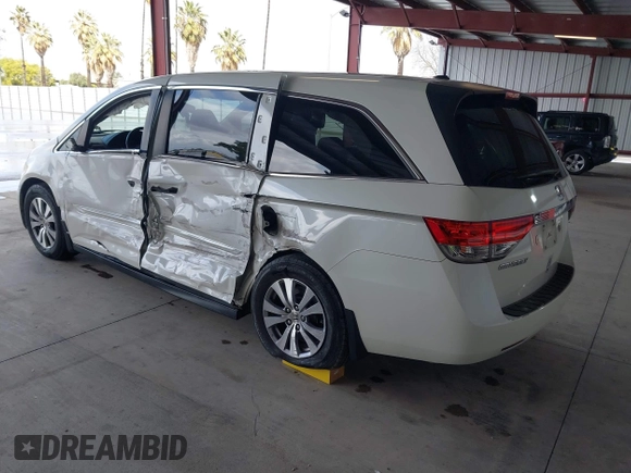 2015 Honda Odyssey EX-L with VIN 5FNRL5H64FB084175, listed as a IAAI auction lot 41943540 with 67,902 mi miles and . Bid and sale history available at carsss.com. Image 3.