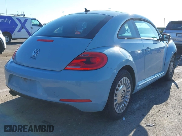 2014 Volkswagen Beetle 2.5L w/Sun with VIN 3VWJP7AT6EM601318, listed as a IAAI auction lot 41902598 with 169,220 mi miles and . Bid and sale history available at DreamBid. Image 4.